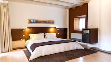 Superior tweepersoonskamer (Rústica) | Donsdekens, bedden met traagschuimmatrassen, een minibar