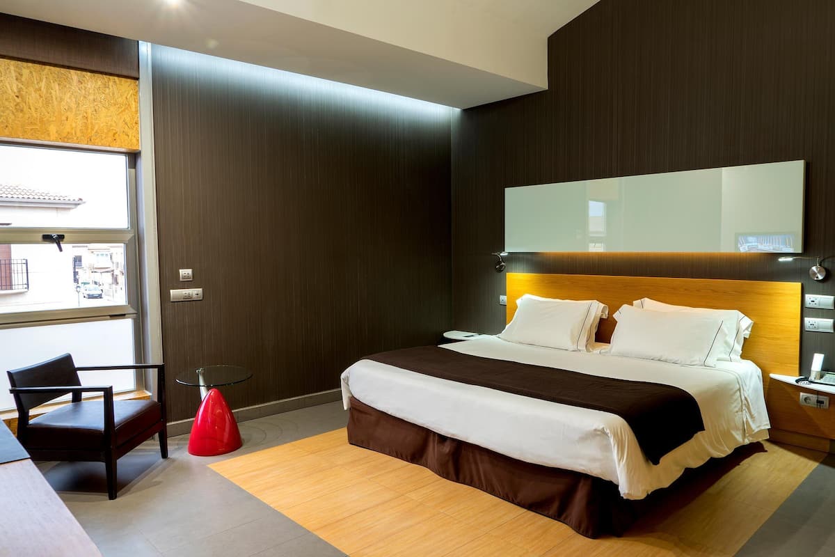 Down comforters, memory foam beds, minibar, in-room safe