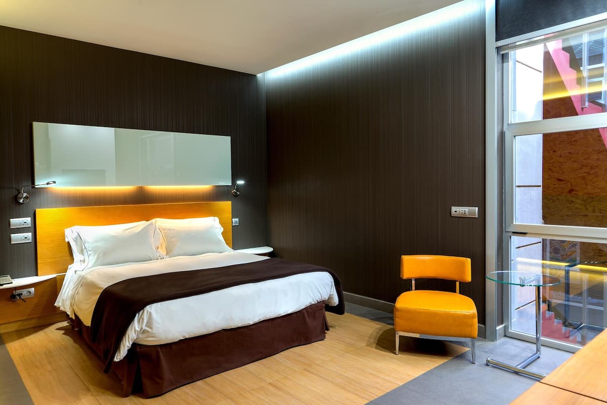 standard double room | down duvets, memory-foam beds, minibar, in-room safe