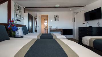 Triple Room | Select Comfort beds, in-room safe, desk, blackout drapes