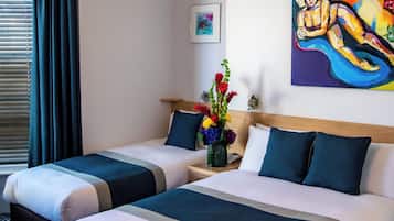 Triple Room | Select Comfort beds, in-room safe, desk, blackout drapes