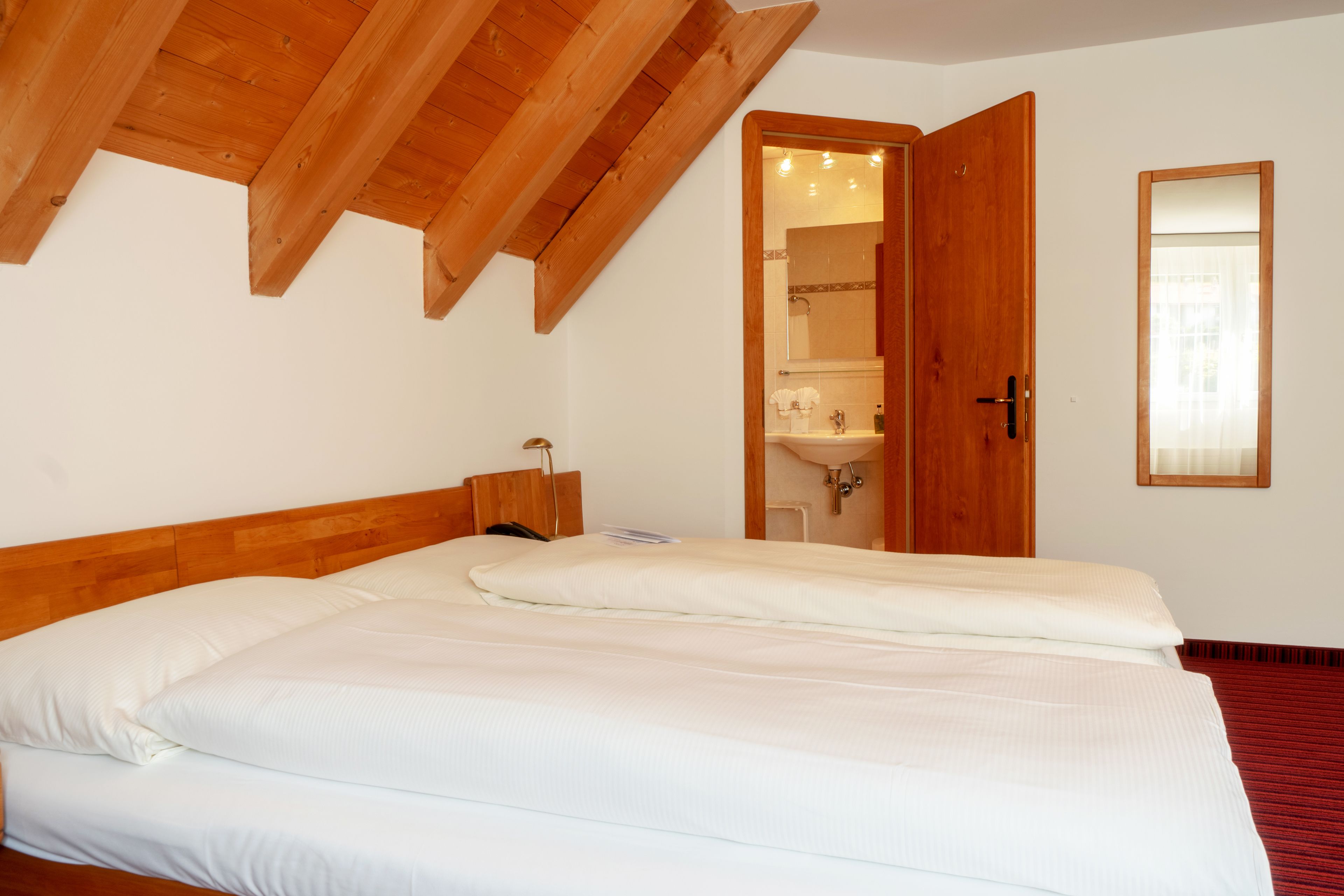 deluxe room | hypo-allergenic bedding, down duvets, in-room safe, desk