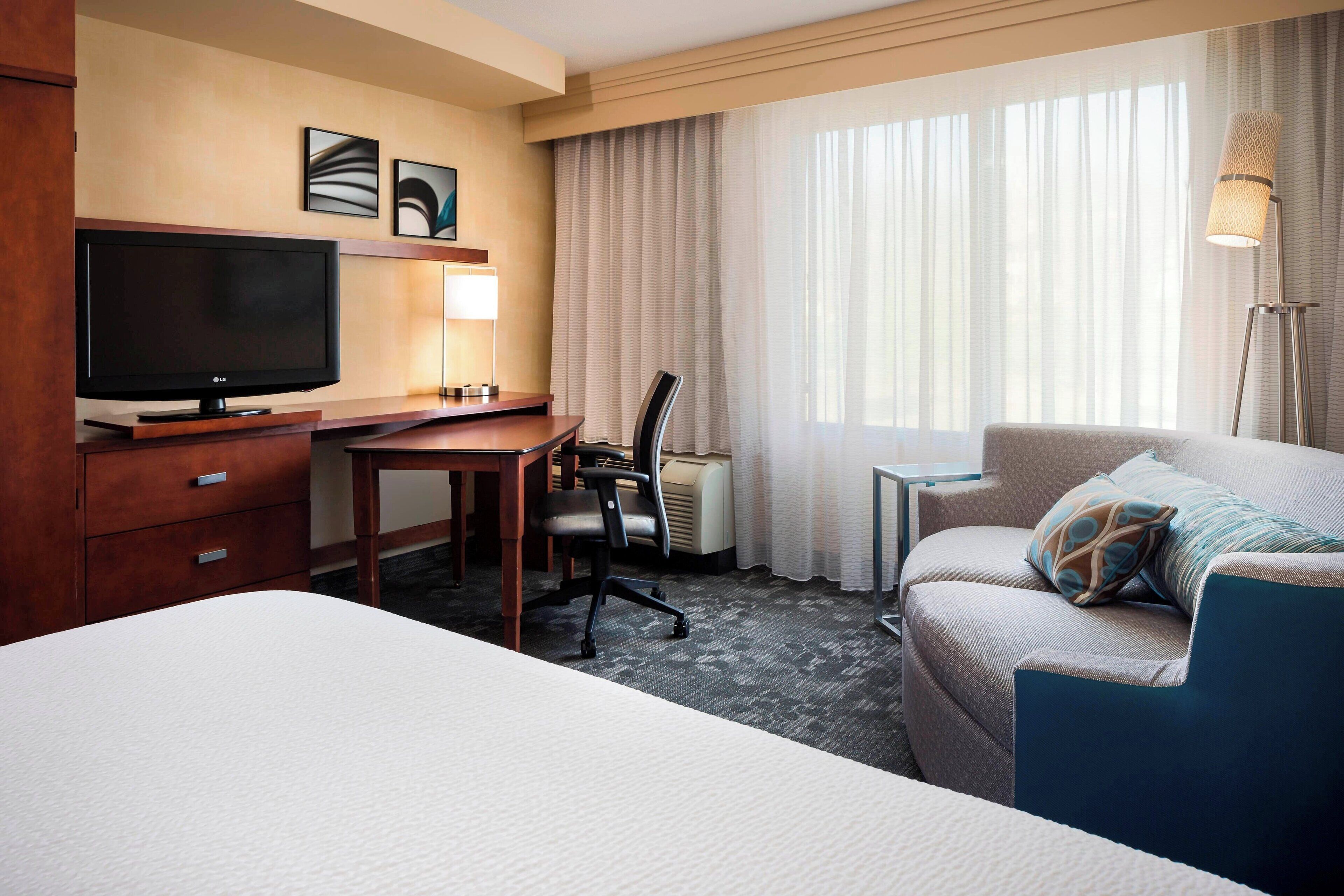 room, 1 king bed with sofa bed | premium bedding, desk, laptop workspace, blackout curtains