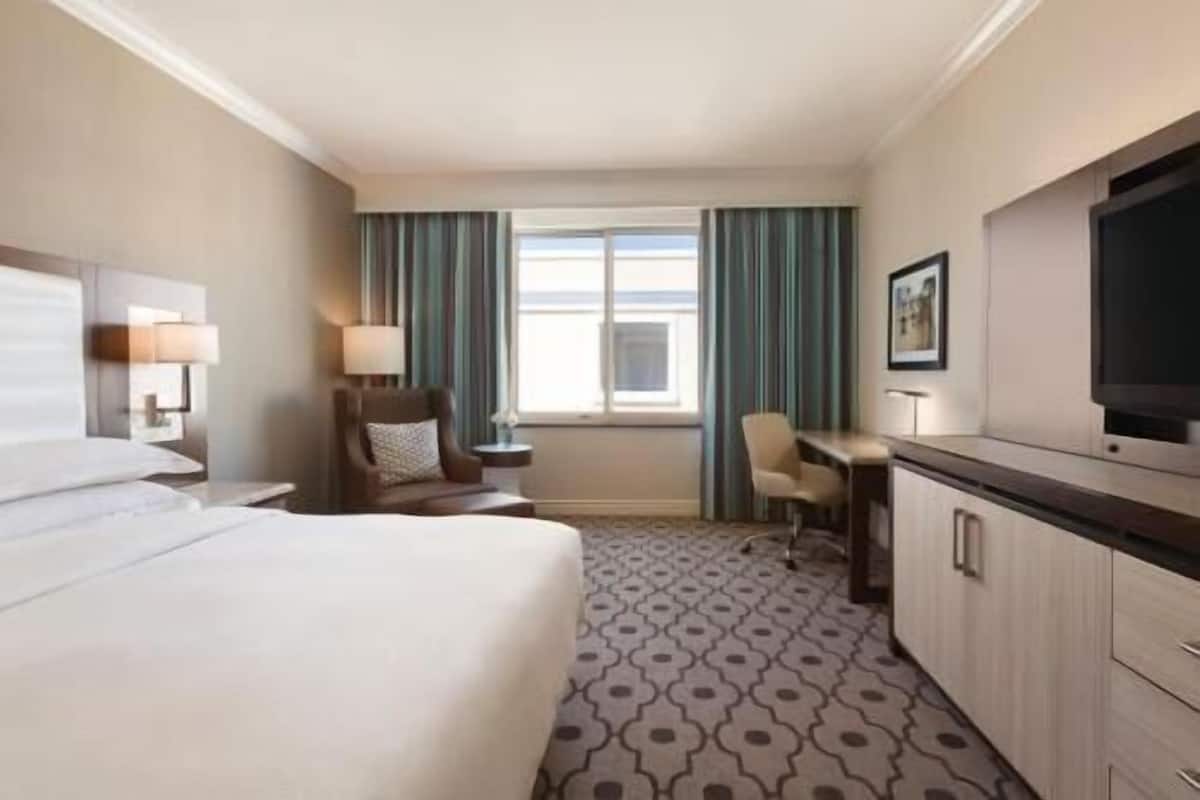 1 bedroom, premium bedding, down comforters, in-room safe