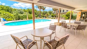 Outdoor pool, open 7 AM to 11 PM, sun loungers