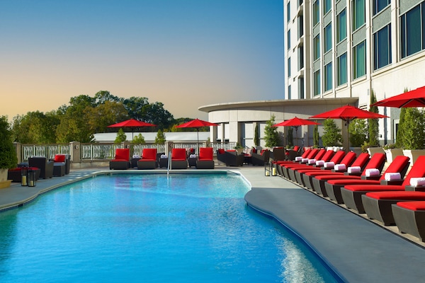 Outdoor pool, open 7:00 AM to 9:00 PM, pool umbrellas, sun loungers