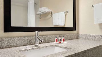 Combined shower/tub, hair dryer, towels, soap
