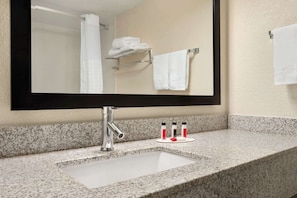 Combined shower/tub, hair dryer, towels, soap
