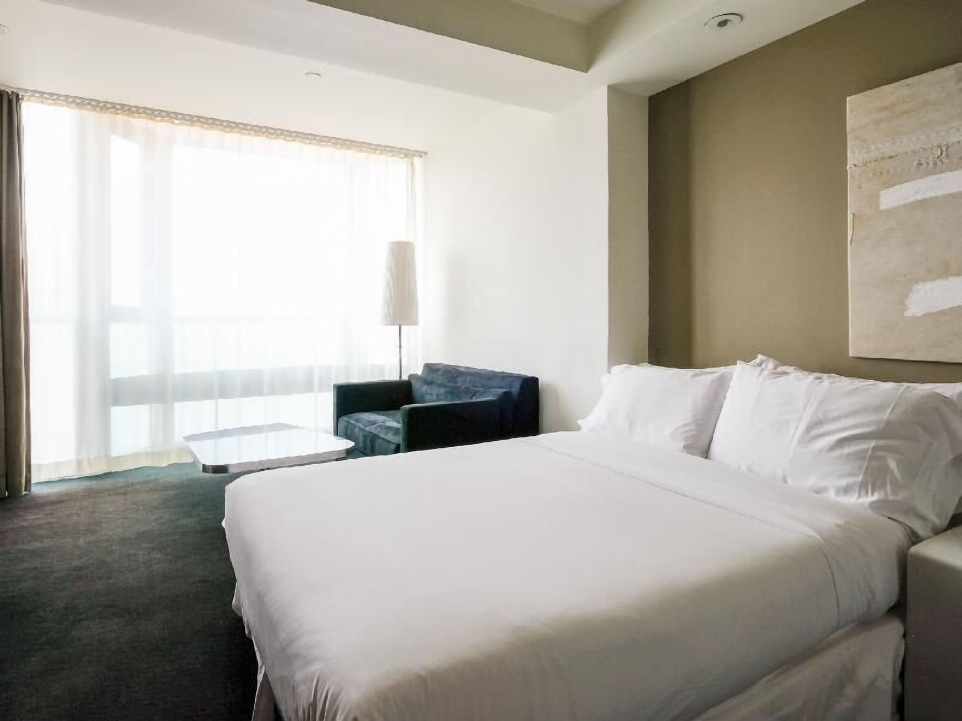 Frette Italian sheets, premium bedding, down comforters