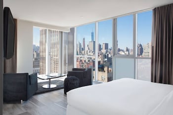 Premium Room, 1 Bedroom, Bathtub, City View | Frette Italian sheets, premium bedding, down comforters at Hotel On Rivington