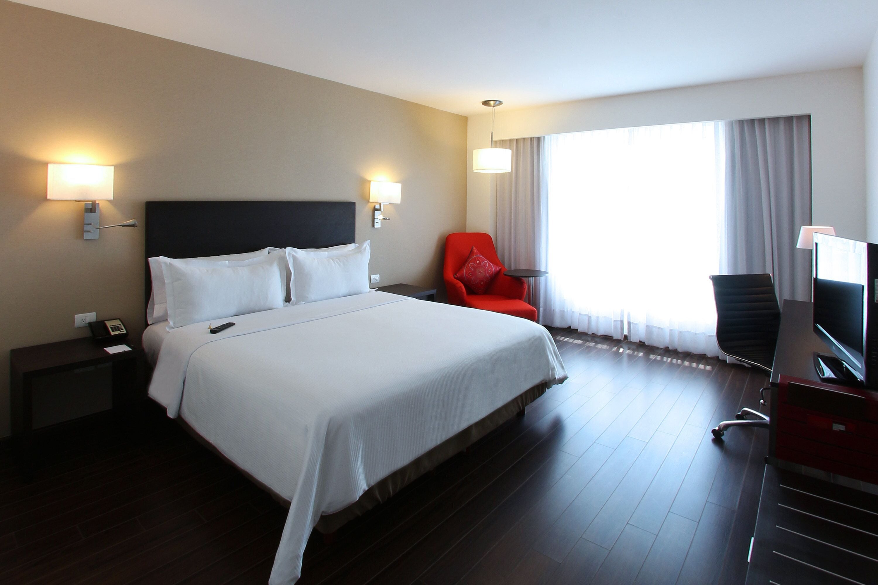 superior room, 1 king bed | in-room safe, desk, iron/ironing board, free cots/infant beds
