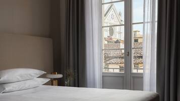 Deluxe Room | Premium bedding, minibar, in-room safe, individually decorated