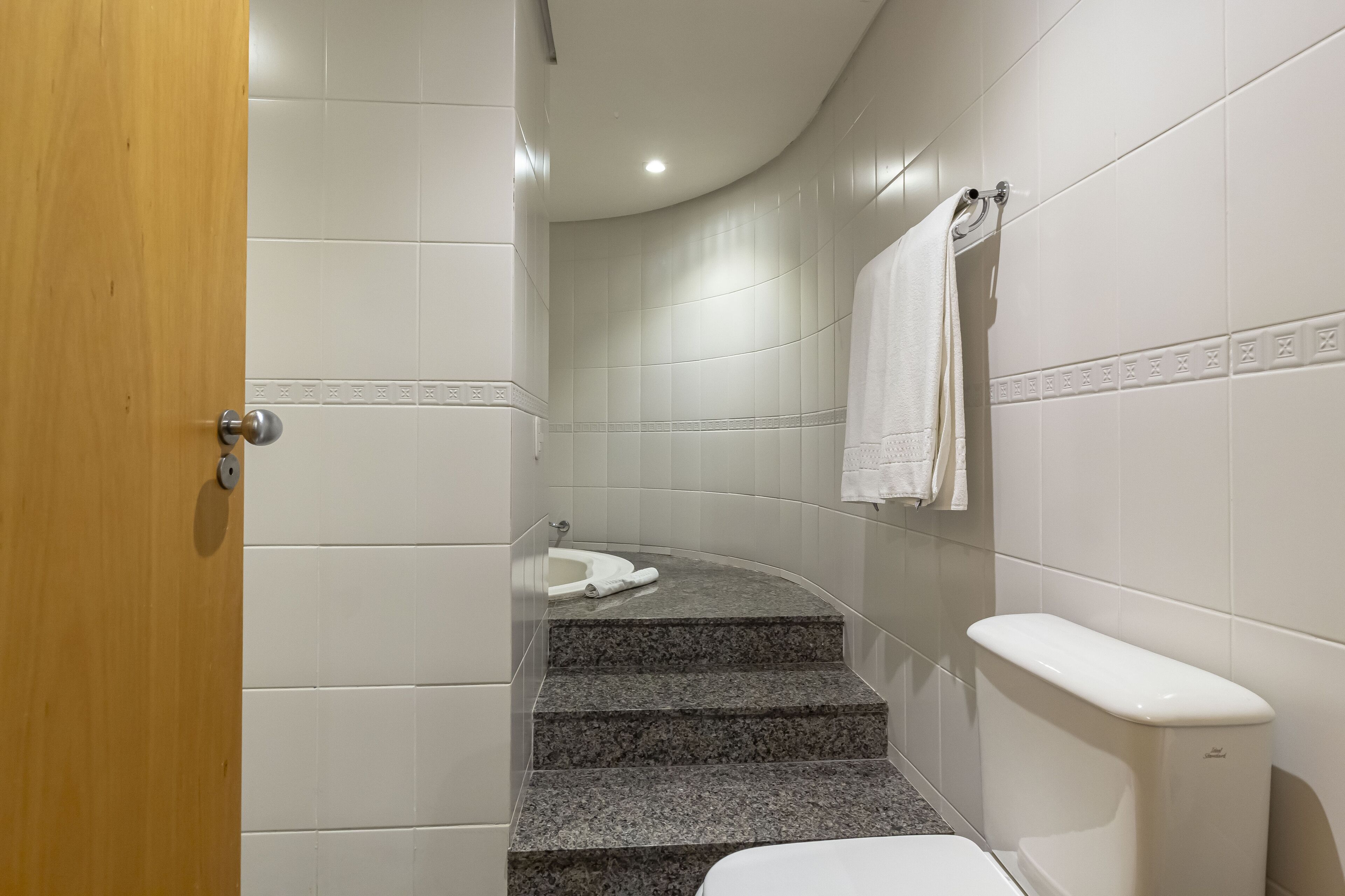 suite | bathroom | shower, hair dryer, towels