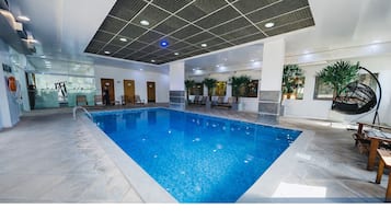 Indoor pool, open 8:00 AM to 8:00 PM, sun loungers
