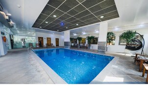 Indoor pool, open 8:00 AM to 8:00 PM, sun loungers