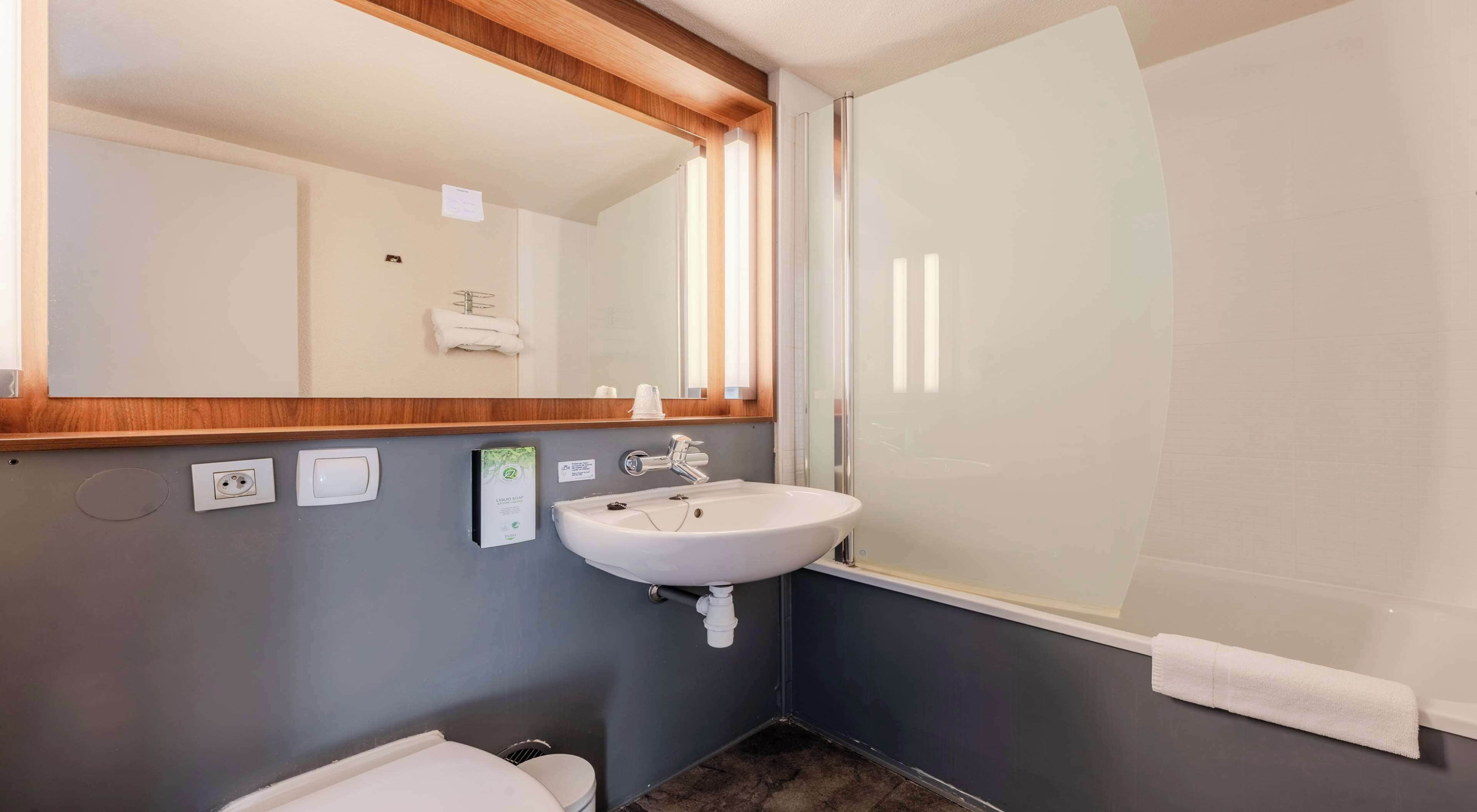 eco-friendly toiletries, hair dryer, towels