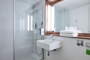 Eco-friendly toiletries, hair dryer, towels, soap