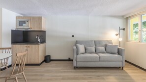 Quarto superior, 1 cama King e sofá-cama | Cozinha americana privada | Cafeteira/chaleira, produtos de limpeza biodegradáveis disponíveis