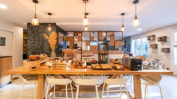 Daily buffet breakfast (EUR 14 per person)