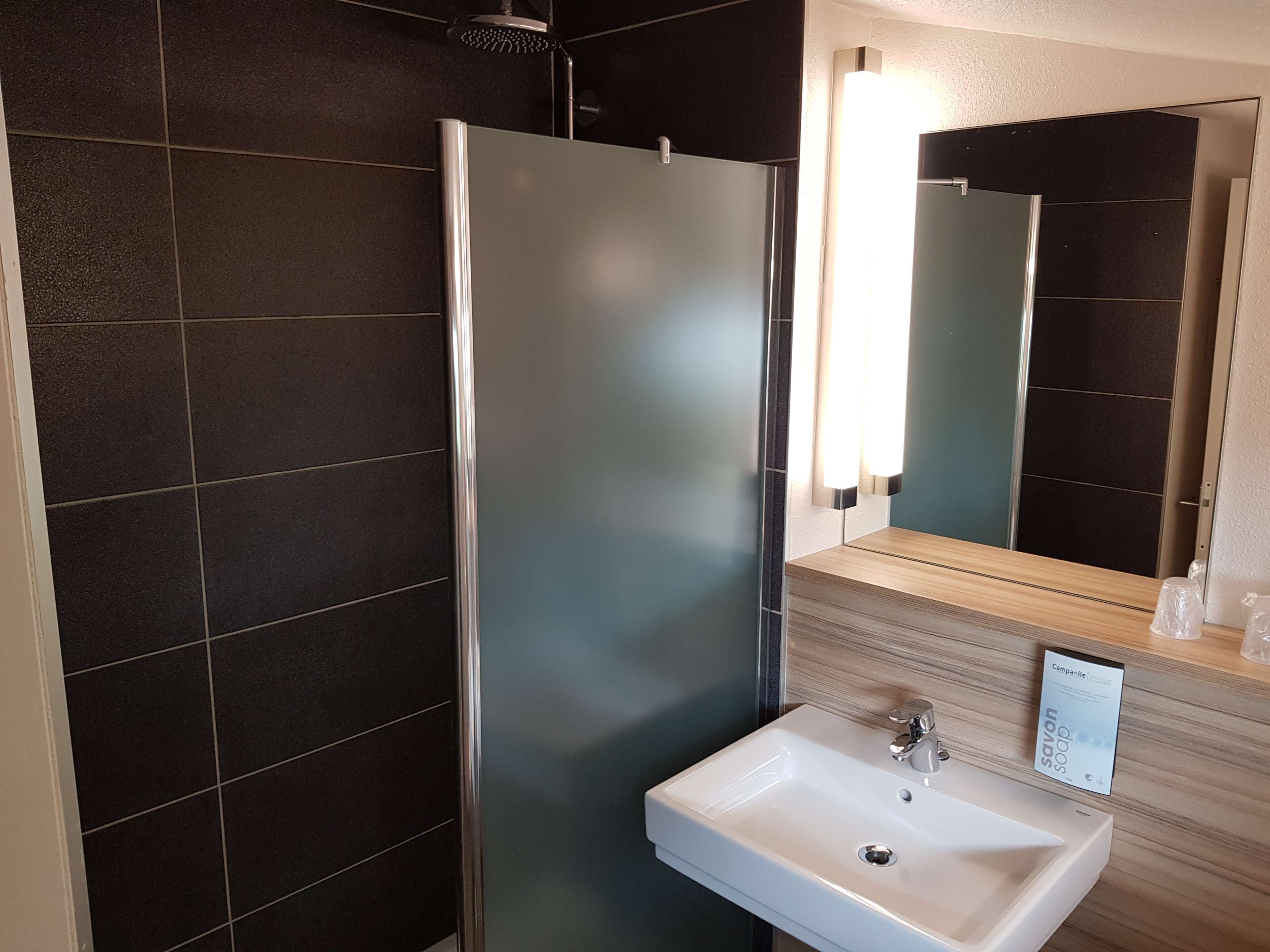 eco-friendly toiletries, hair dryer, towels