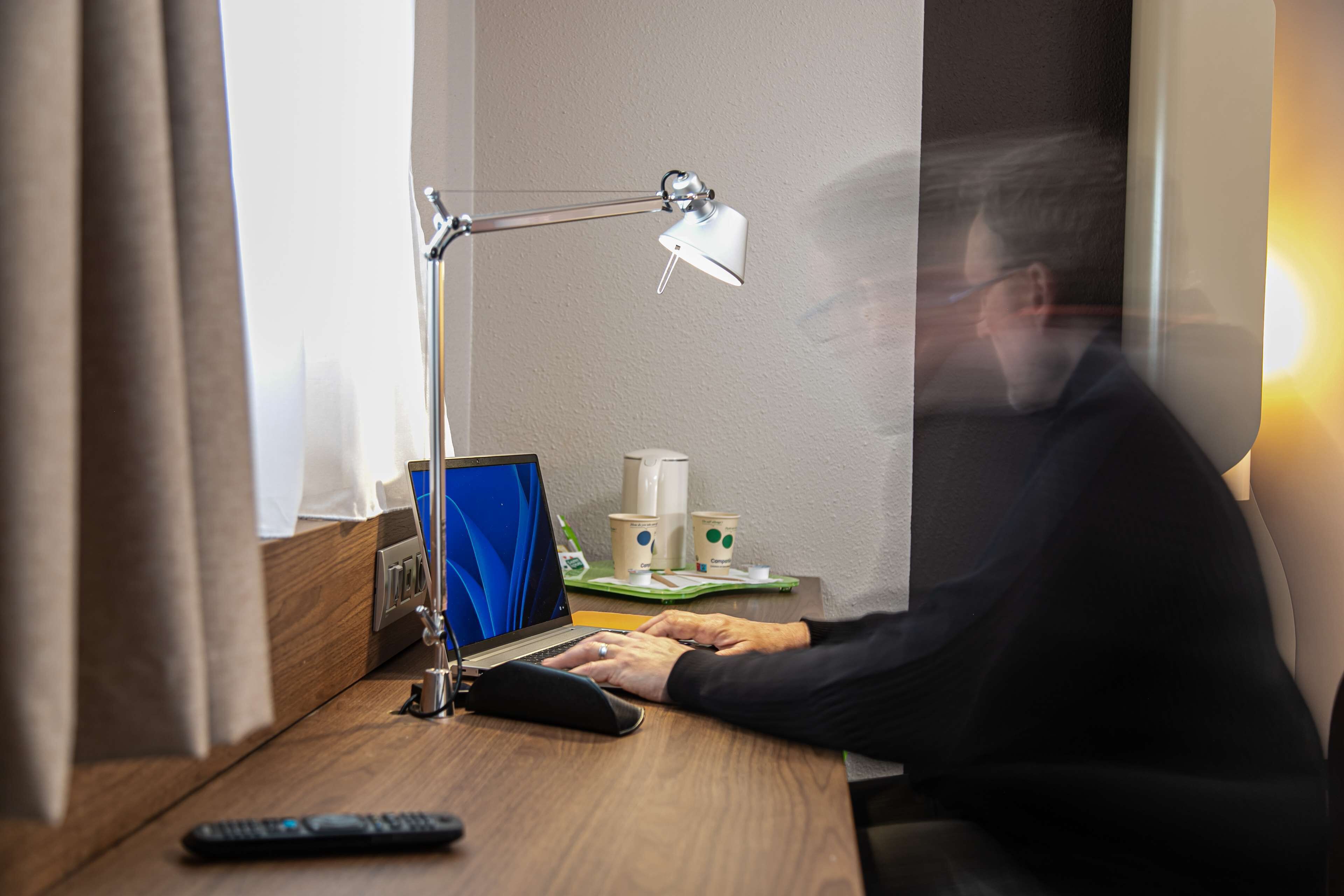 premium bedding, desk, laptop workspace, soundproofing