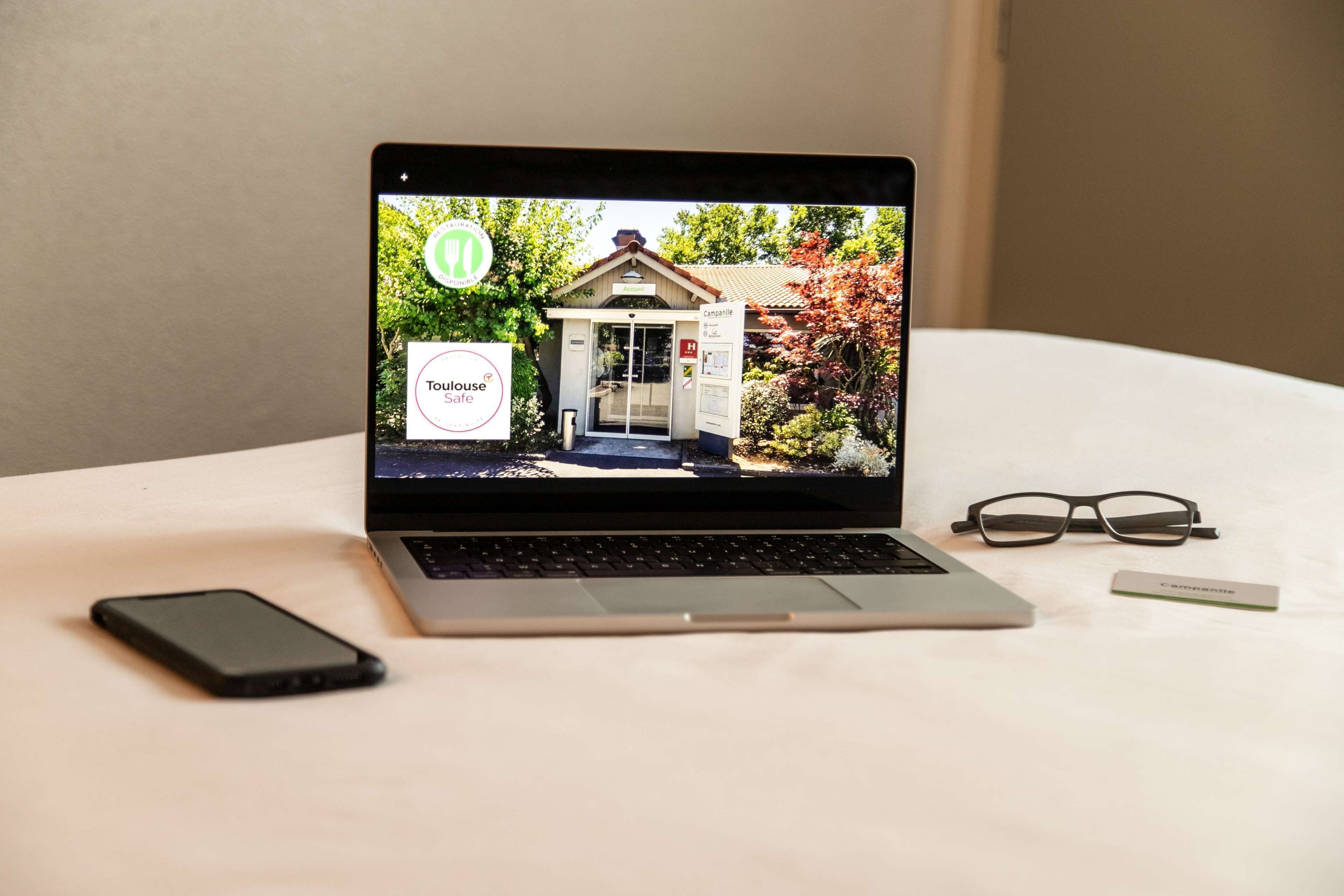 premium bedding, desk, laptop workspace, soundproofing