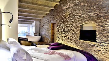 Suite, 1 cama Queen size | Minibar, decoración personalizada, muebles diferentes y insonorización
