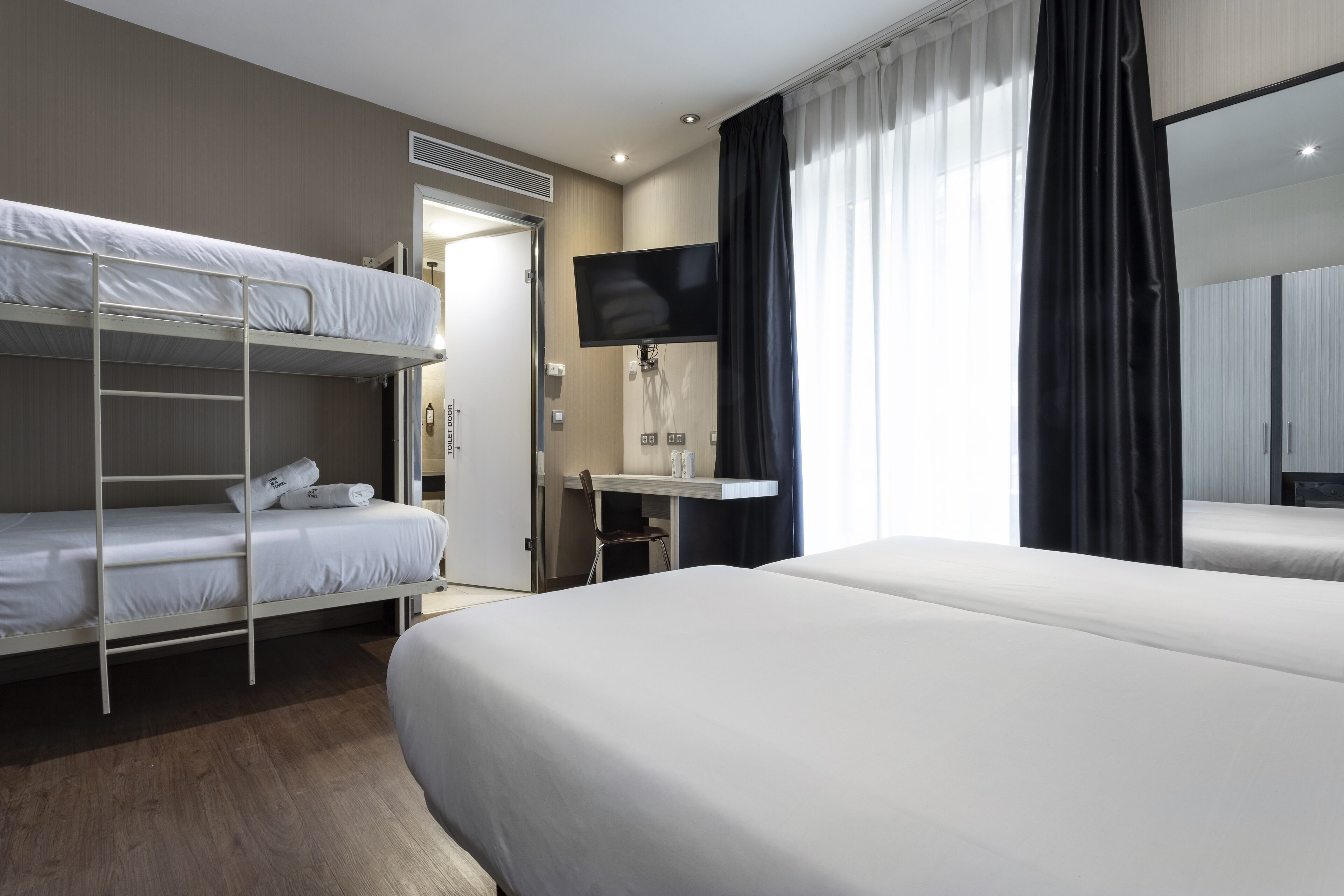 quadruple room, gran via view | 1 bedroom, in-room safe, desk, blackout curtains