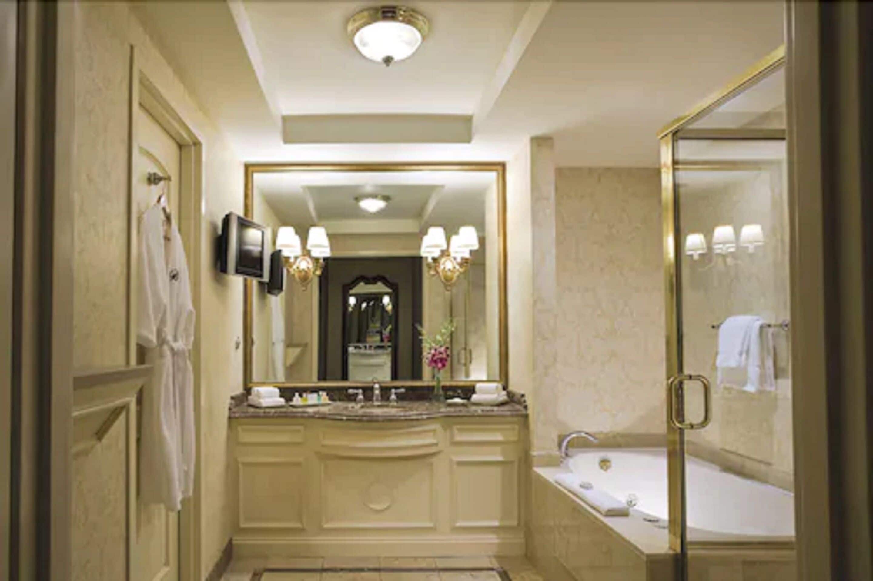 combined shower/bathtub, rainfall showerhead, designer toiletries