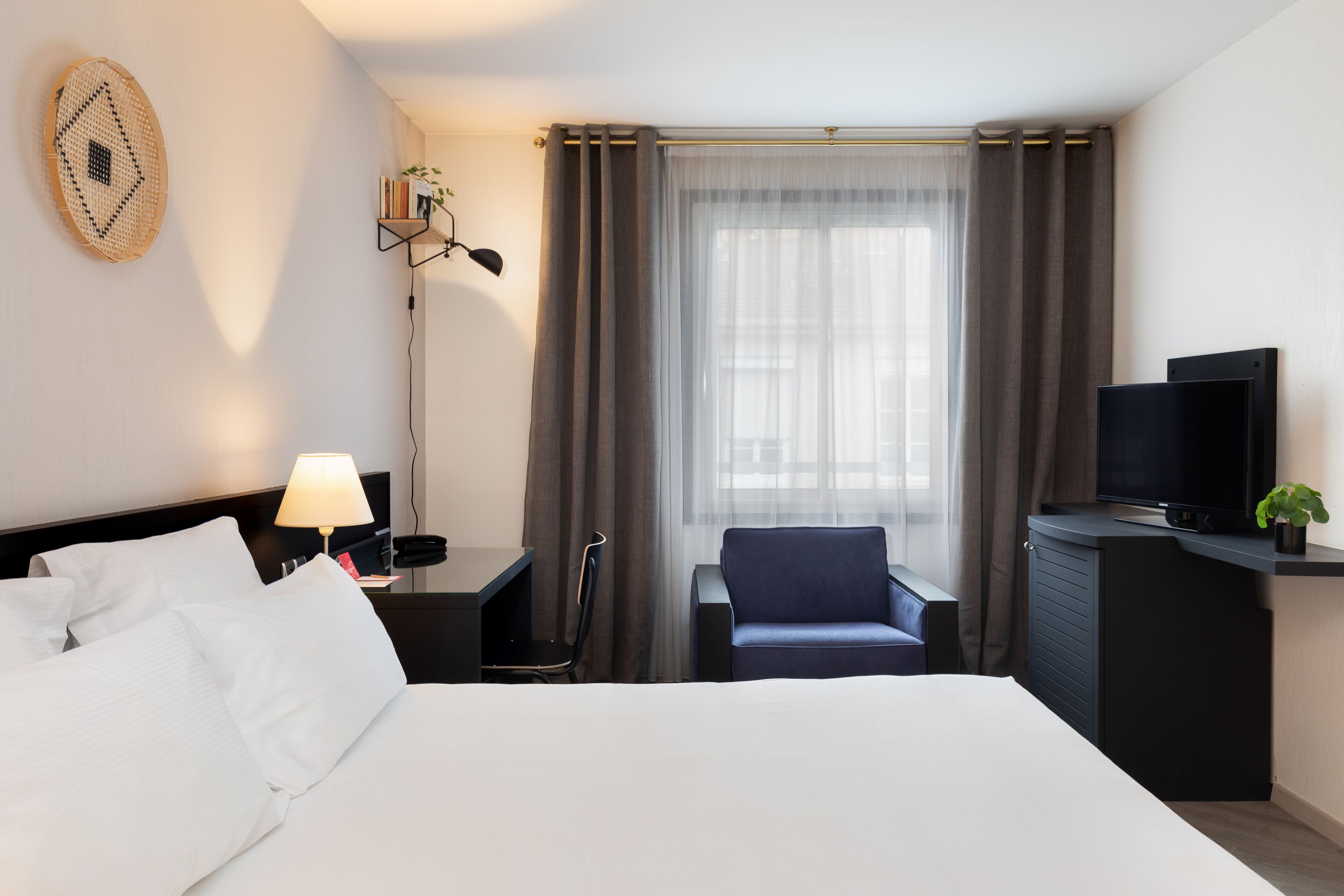 Family Room | Premium bedding, desk, laptop workspace, blackout drapes