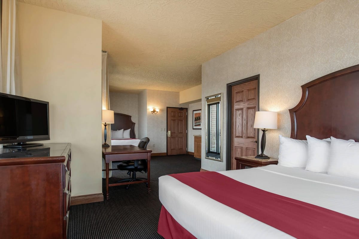Suite, Multiple Beds, Non Smoking | Desk, laptop workspace, blackout drapes, soundproofing