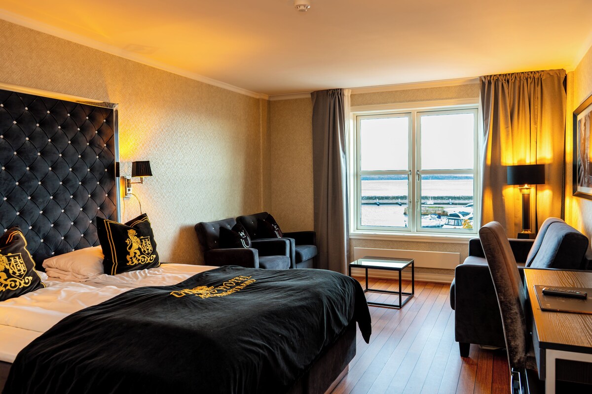 Ropa de cama de alta calidad, minibar, cortinas blackout y wifi gratis