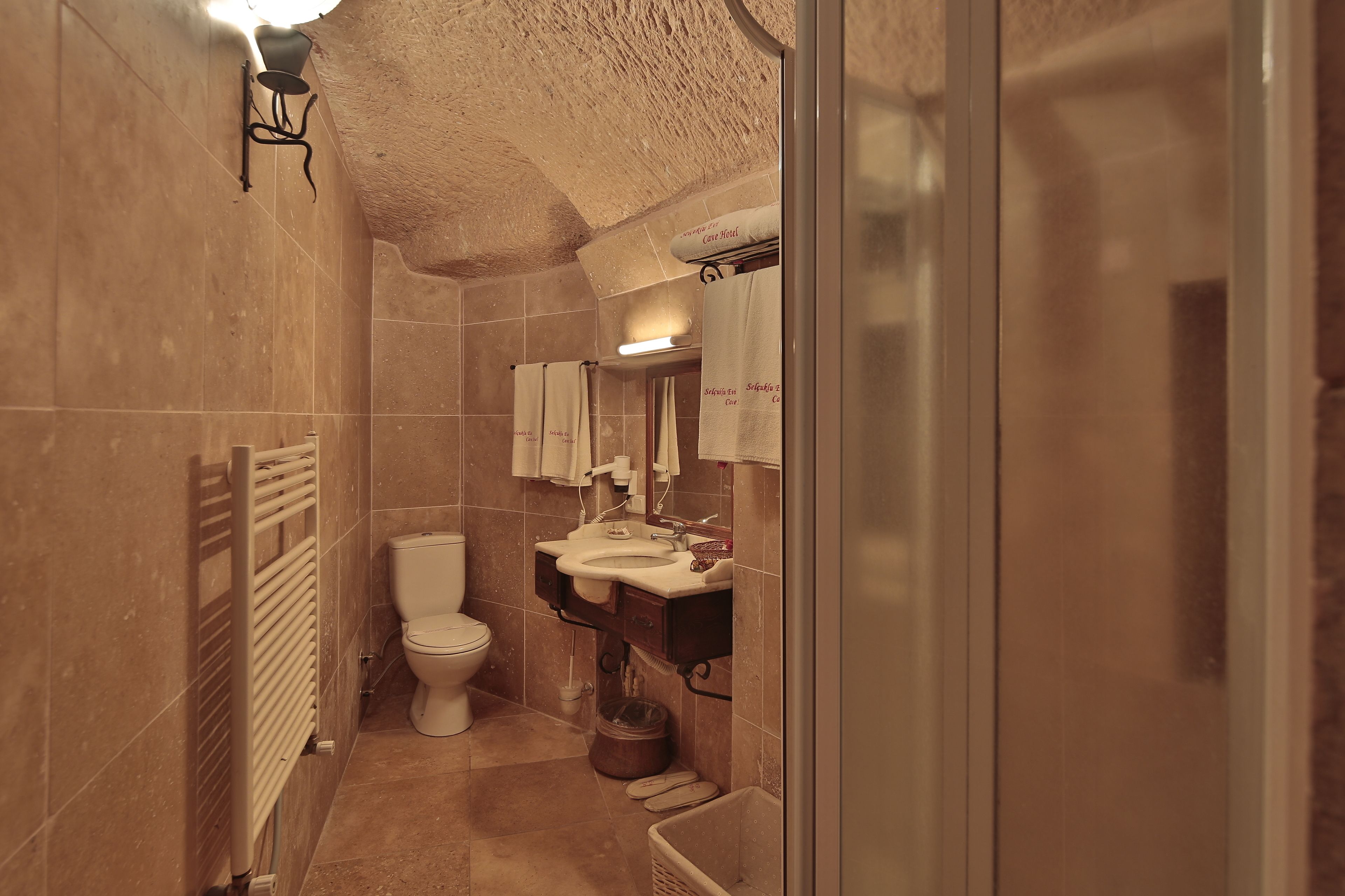 family suite | bathroom | free toiletries, hair dryer, slippers, towels