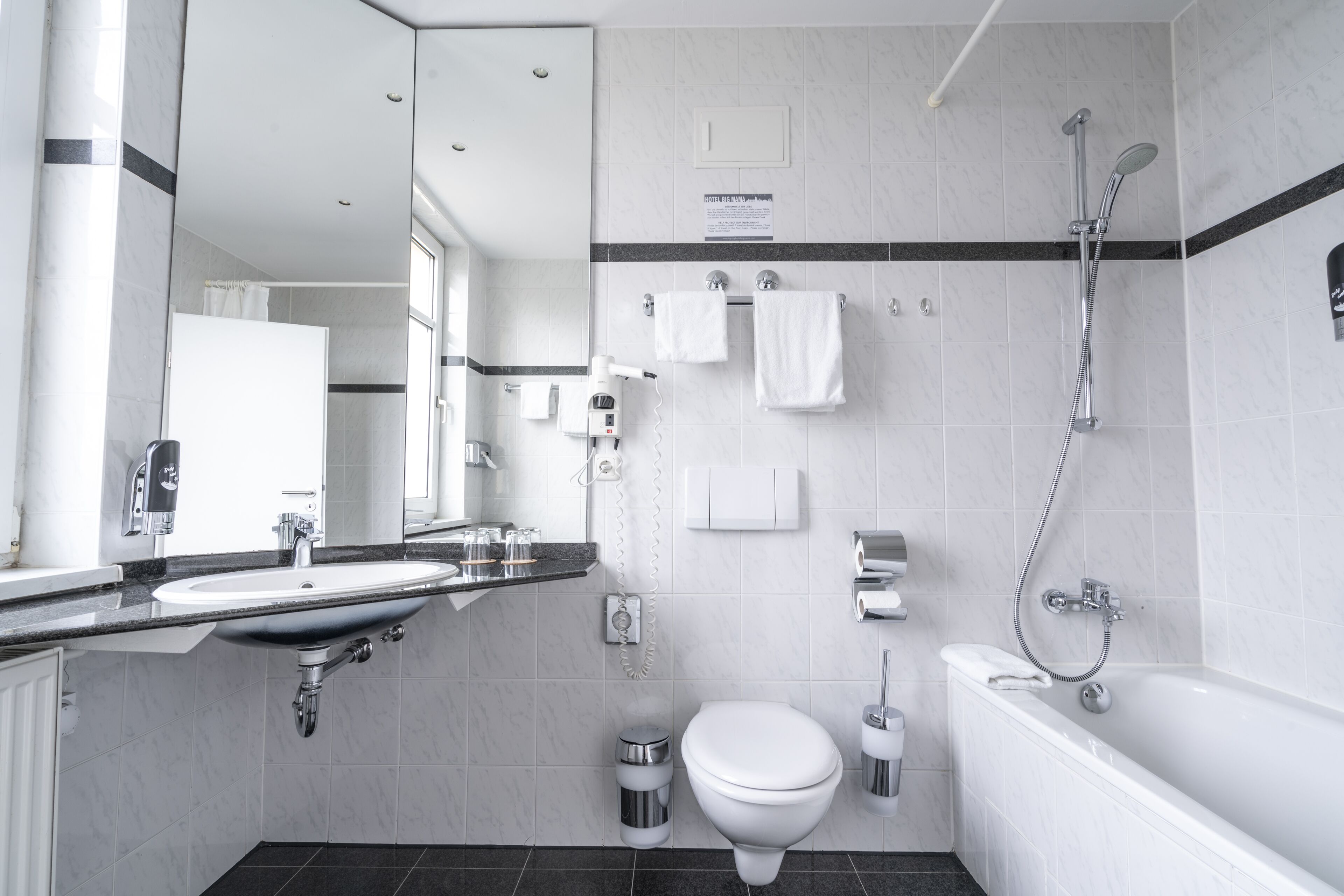 standard double room | bathroom | hair dryer, towels