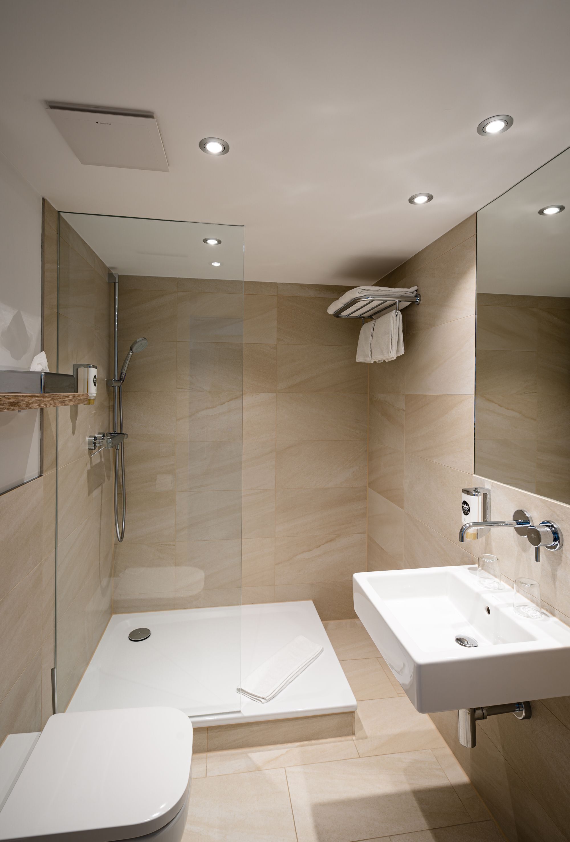 superior room courtyard area | bathroom | hair dryer, towels