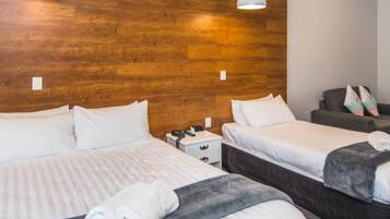 Superior Studio | 1 bedroom, desk, blackout drapes, iron/ironing board