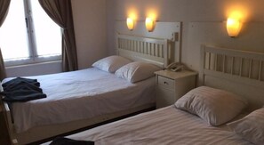 Basic Quadruple Room, Shared Bathroom | Egyptian cotton sheets, in-room safe, free WiFi