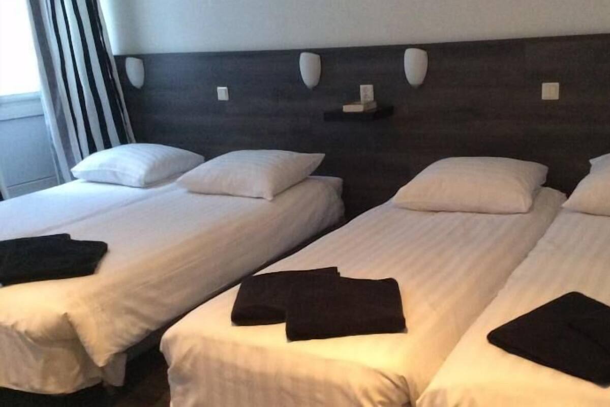 Basic Quadruple Room, Shared Bathroom | Egyptian cotton sheets, in-room safe, free WiFi
