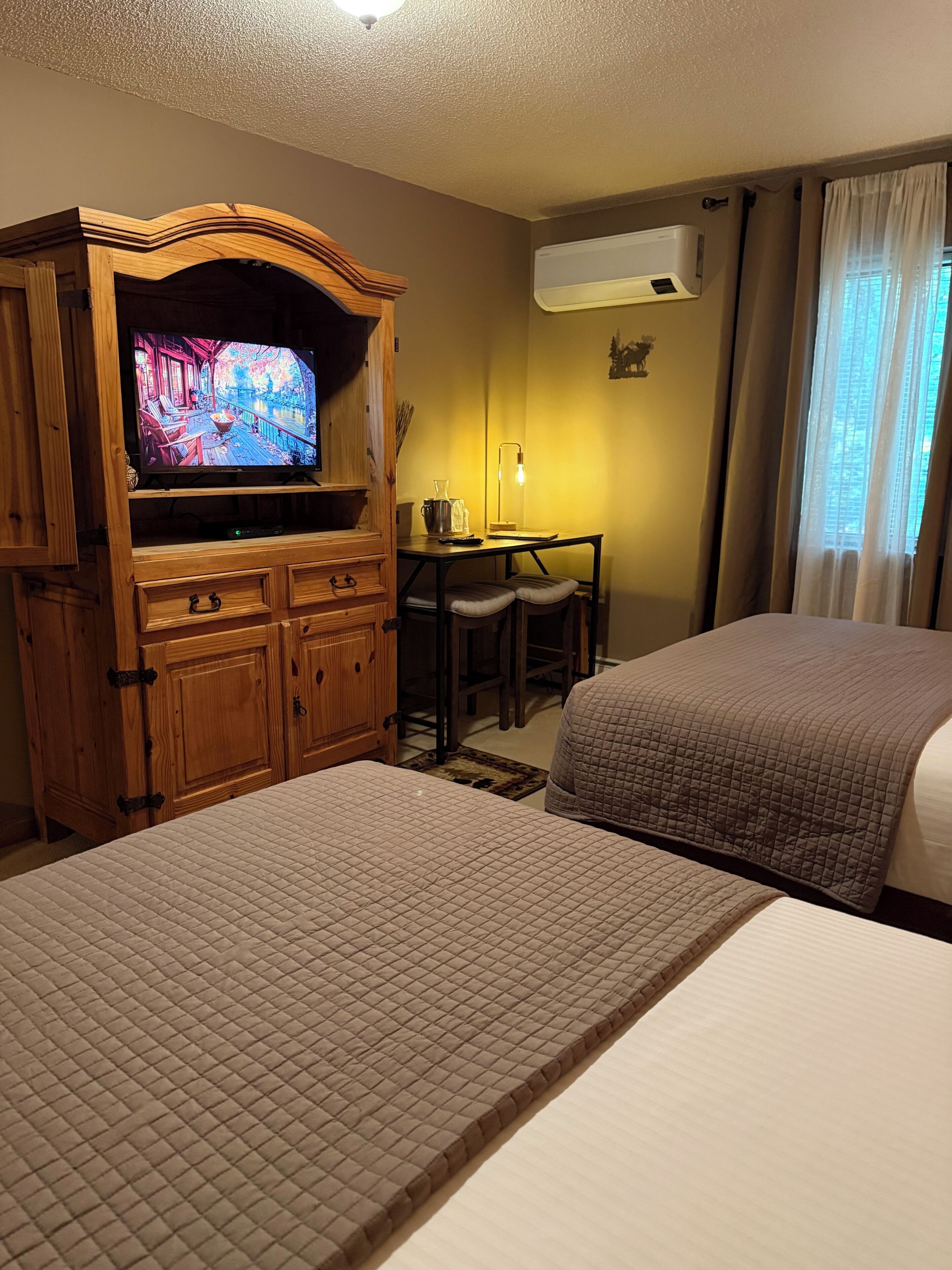 Standard Room, 2 Queen Beds (103) | Individually decorated, individually furnished, iron/ironing board