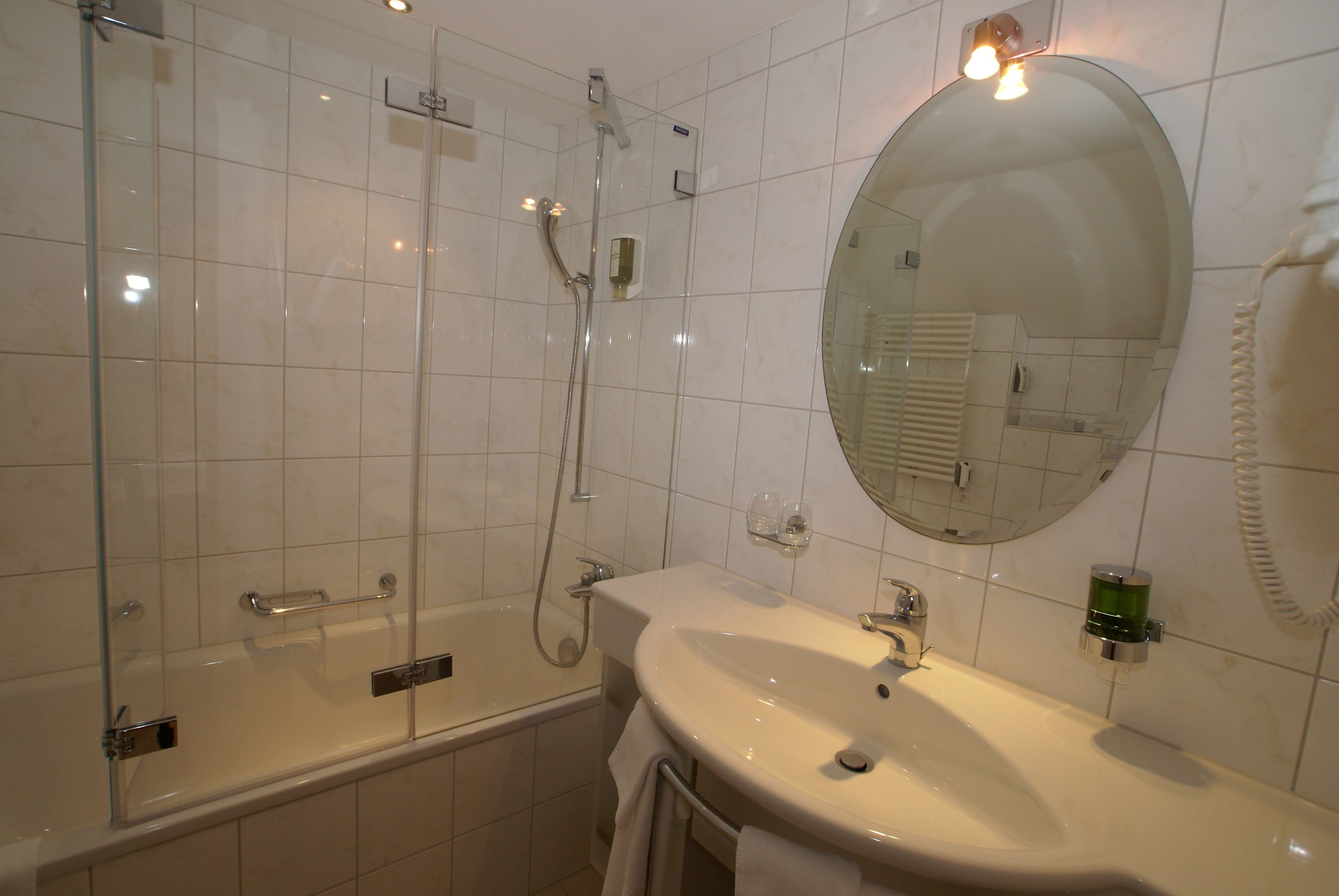 standard double room | bathroom | hair dryer, towels