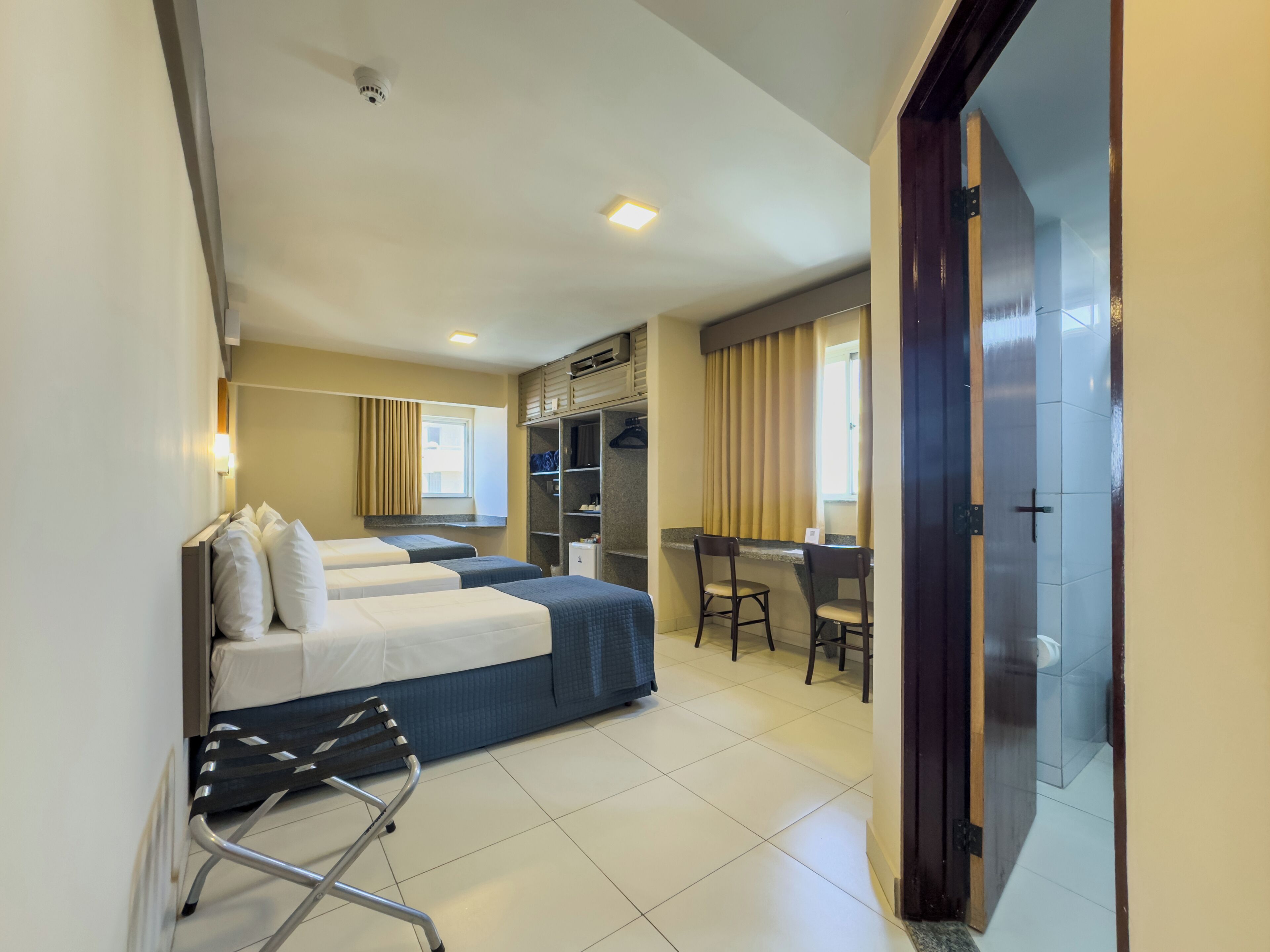 Standard Quadruple Room, Multiple Beds, City View (Accessible) | Minibar, in-room safe, desk, laptop workspace