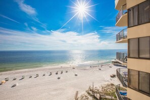On the beach, sun-loungers, beach umbrellas - Sunbird Beach Resort by Resort Collection (Panama City Beach)