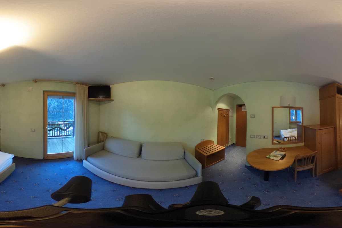 Family Room, Balcony | Hypo-allergenic bedding, minibar, in-room safe, desk