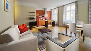 Business Suite, 1 Bedroom | Living area | 80-cm LCD TV with cable channels, TV, DVD player