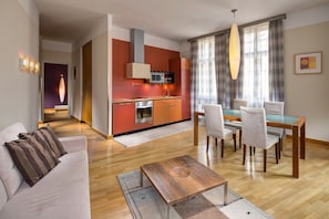 Executive Suite, 1 Bedroom | Living area | 80-cm LCD TV with cable channels, TV, DVD player - Mamaison Residence Belgicka (Prague)