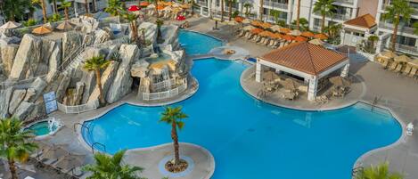 2 outdoor pools, open 8:00 AM to 10:00 PM, pool umbrellas, pool loungers