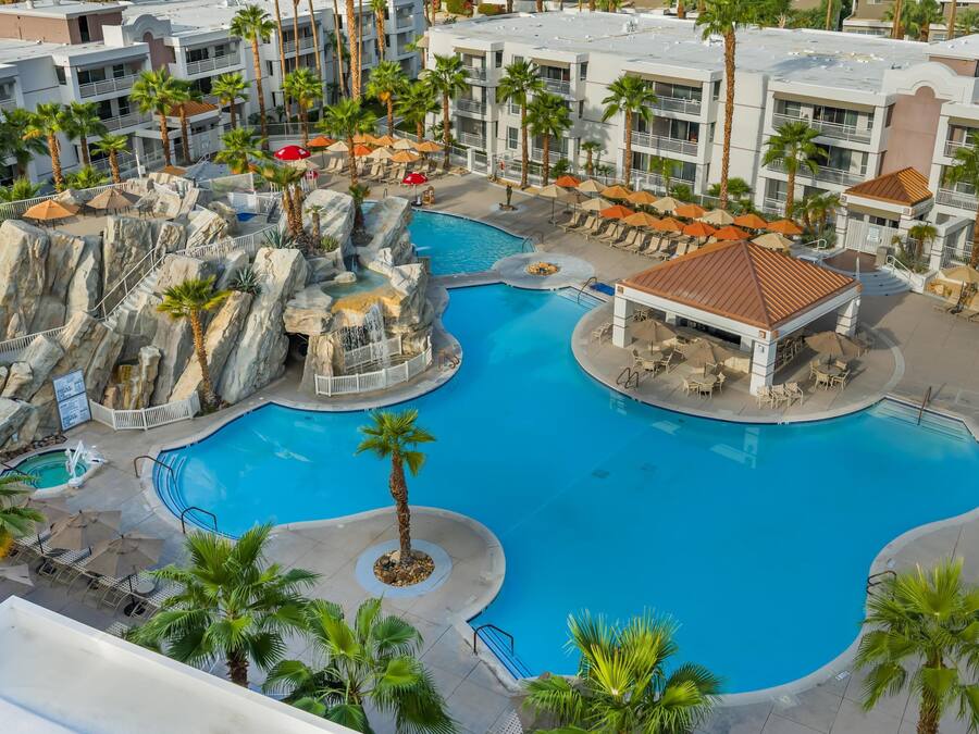 2 outdoor pools, open 8:00 AM to 10:00 PM, pool umbrellas, sun loungers