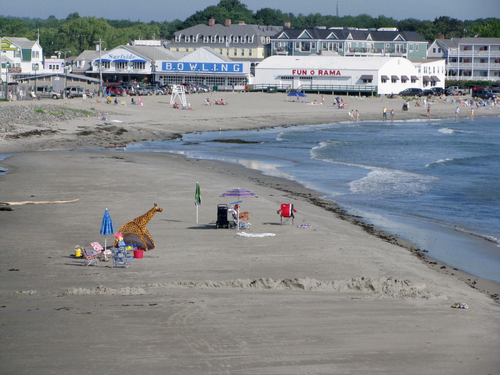 A beach with a bowling alley and a Fun O Rama building.