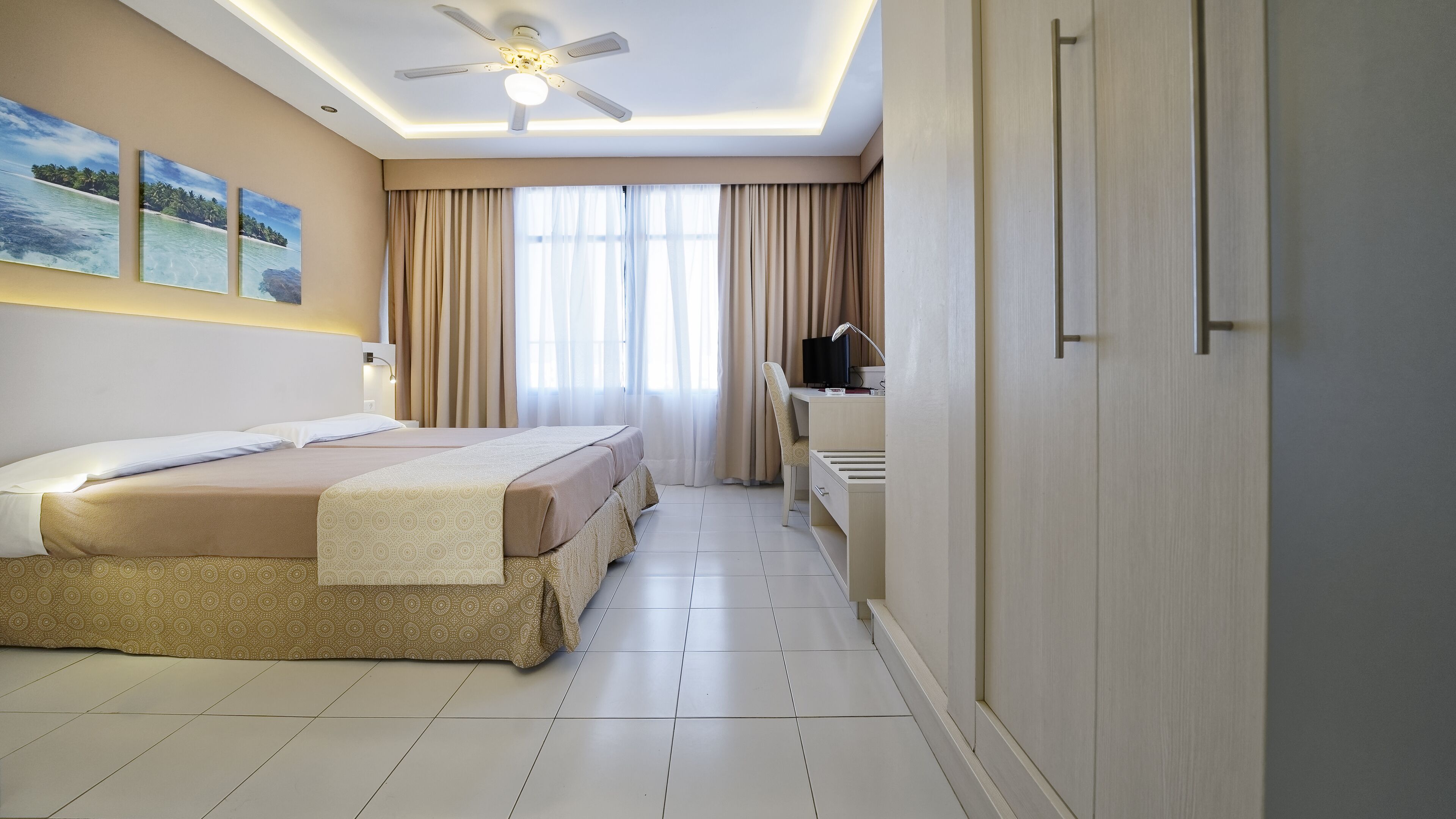 single room | in-room safe, desk, blackout curtains, free wifi