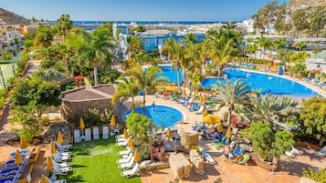 2 outdoor pools, pool umbrellas, sun loungers